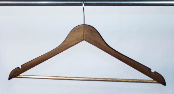 Antique solid wood hanger for clothes isolated,hanger are semi-auto polishing on either side, can be obtains a firm anti slip pvc cover on bar on garments. Smooth notched cares your dressing